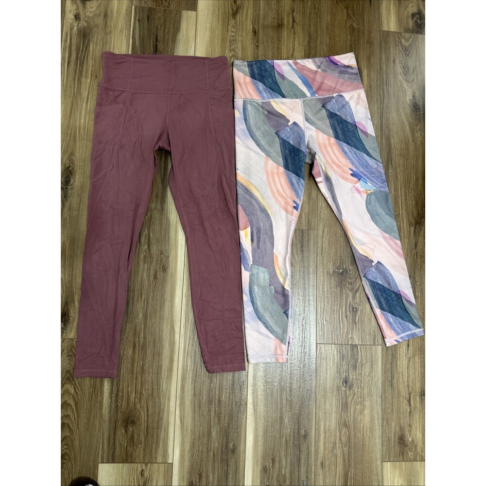 Athleta Salutation Stash pocket & Elation HR Bundle Of 2 Pair Of Leggings Size M